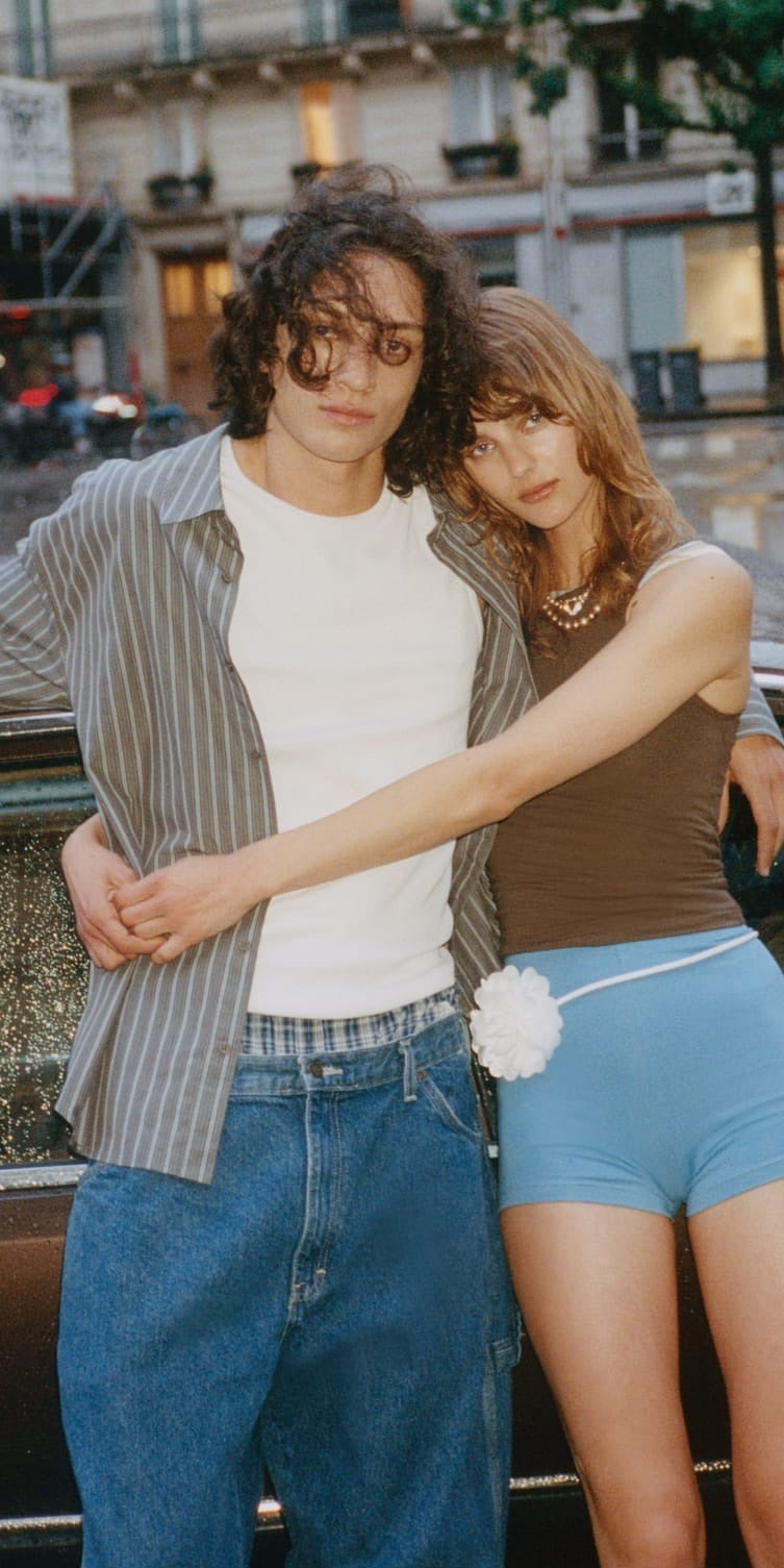 Two models in Organic Basics underwear and tees on a Paris street